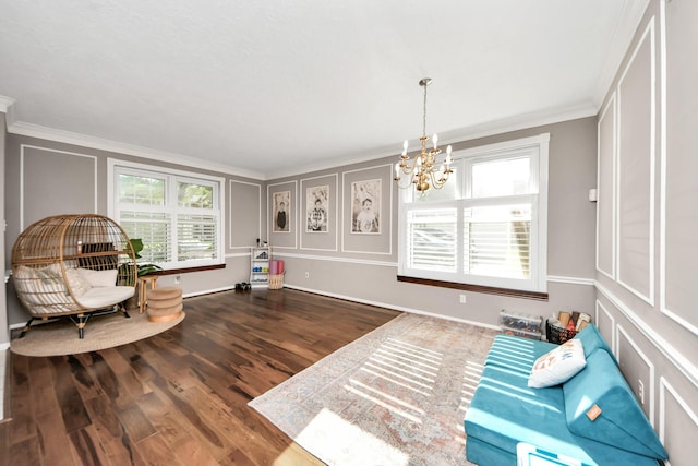 23227 Diamond Knoll Ct, Katy, TX 77494 - sitting room with a chandelier, dark wood finished floors, and crown molding