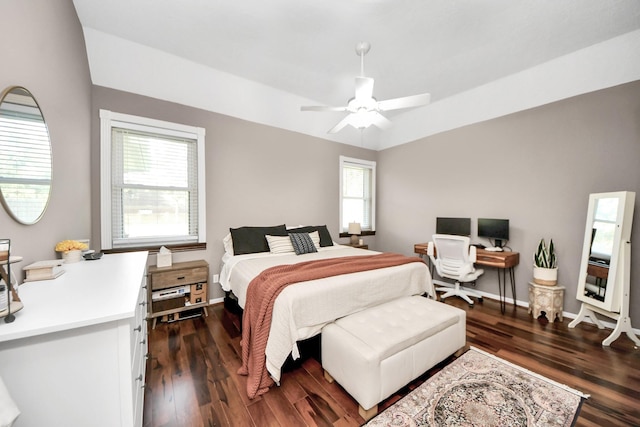 23227 Diamond Knoll Ct, Katy, TX 77494 - bedroom with an office area, dark wood-style flooring, multiple windows, and a ceiling fan