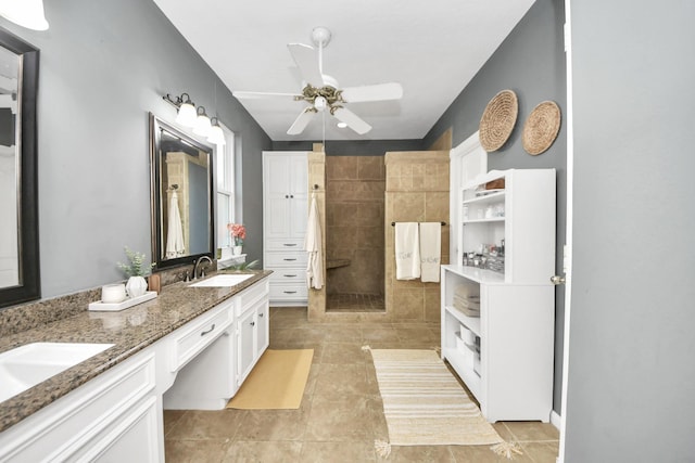 23227 Diamond Knoll Ct, Katy, TX 77494 - bathroom with double vanity, a tile shower, a ceiling fan, and tile patterned floors