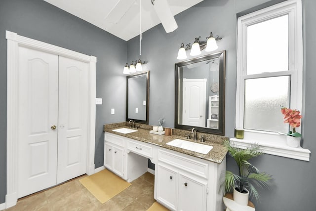 23227 Diamond Knoll Ct, Katy, TX 77494 - bathroom featuring double vanity, a ceiling fan, and tile patterned flooring