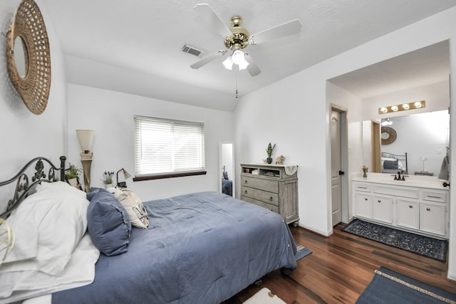 23227 Diamond Knoll Ct, Katy, TX 77494 - bedroom with dark wood-style flooring, connected bathroom, and a ceiling fan