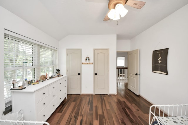 23227 Diamond Knoll Ct, Katy, TX 77494 - bedroom featuring dark wood-style flooring, vaulted ceiling, and ceiling fan