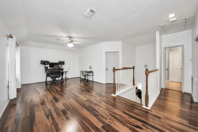 23227 Diamond Knoll Ct, Katy, TX 77494 - office area featuring attic access, wood finished floors, a ceiling fan, recessed lighting, and a textured ceiling