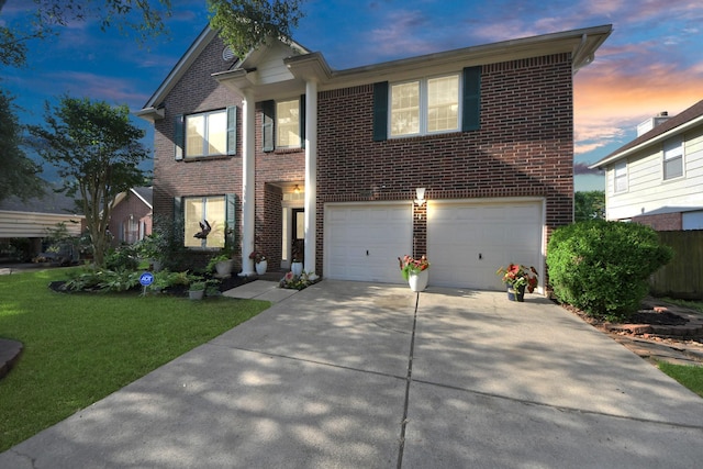 23227 Diamond Knoll Ct, Katy, TX 77494 - view of front of house with brick siding, concrete driveway, an attached garage, and a lawn