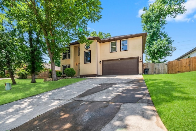 4313 Windswept Dr, Montgomery, TX 77356 - view of front of house featuring concrete driveway, an attached garage, and stucco siding