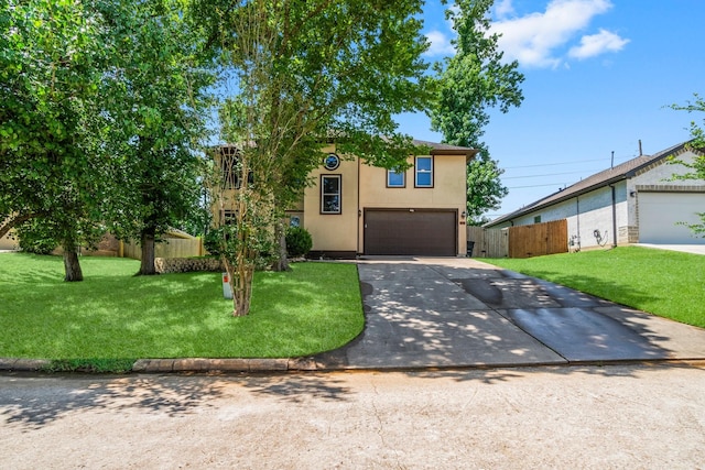 4313 Windswept Dr, Montgomery, TX 77356 - view of front of property with driveway, a garage, and stucco siding
