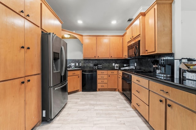 4313 Windswept Dr, Montgomery, TX 77356 - kitchen featuring black appliances, dark countertops, backsplash, crown molding, and light wood-style floors