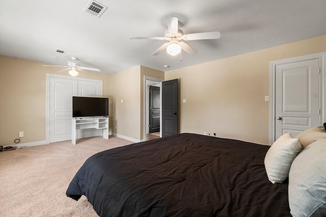 4313 Windswept Dr, Montgomery, TX 77356 - bedroom with light colored carpet, ceiling fan, and a closet