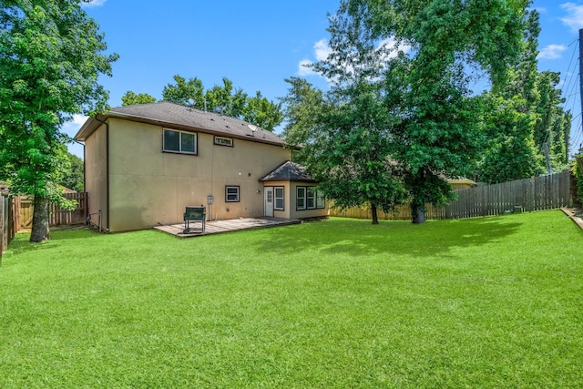 4313 Windswept Dr, Montgomery, TX 77356 - rear view of house with a fenced backyard and a deck
