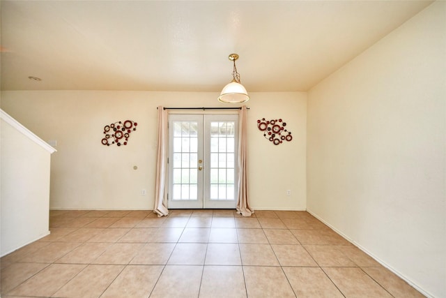 22815 Sherioaks Ln, Spring, TX 77389 - unfurnished dining area with french doors and light tile patterned floors