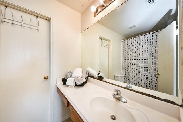 22815 Sherioaks Ln, Spring, TX 77389 - full bathroom featuring vanity, toilet, and a shower with shower curtain