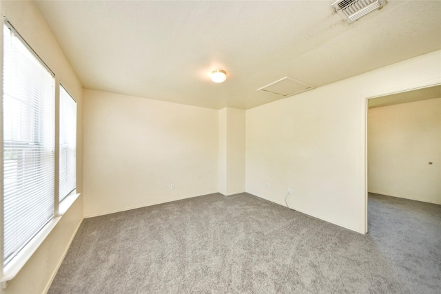 22815 Sherioaks Ln, Spring, TX 77389 - empty room featuring carpet floors and attic access