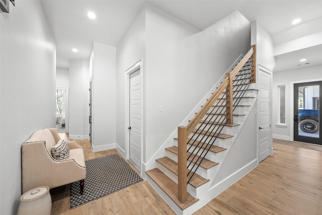 11305 Prince Phillip Ct, Montgomery, TX 77316 - stairway with wood finished floors, recessed lighting, healthy amount of natural light, and baseboards