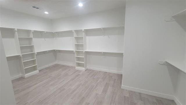 3090 Ethan Symone St, Beaumont, TX 77705 - spacious closet with wood finished floors