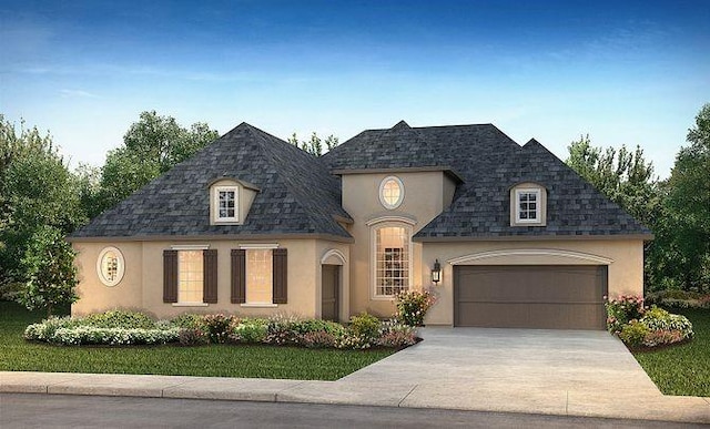 12965 Whitewater Way, Conroe, TX 77302 - french country style house with stucco siding, concrete driveway, and a garage