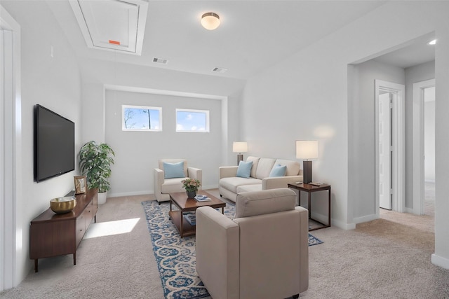 2008 Sugarberry Gully Ln, Conroe, TX 77301 - carpeted living room featuring attic access and baseboards