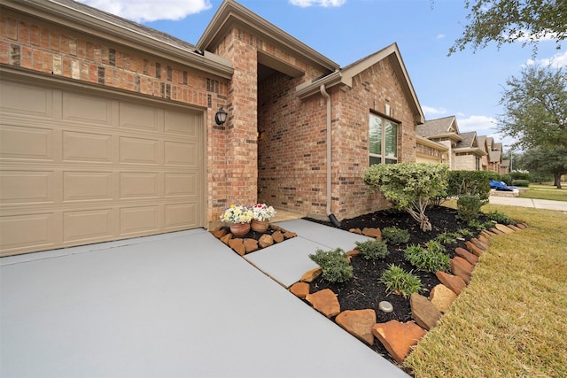 24018 Adobe Ridge Ln, Katy, TX 77493 - view of front facade with brick siding, driveway, and a garage