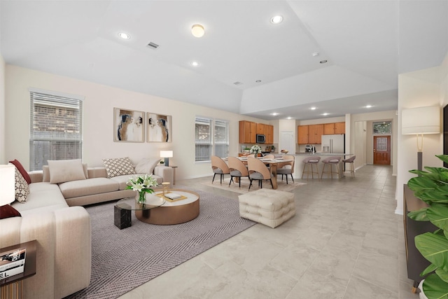 24018 Adobe Ridge Ln, Katy, TX 77493 - living room featuring lofted ceiling, recessed lighting, baseboards, and light tile patterned floors