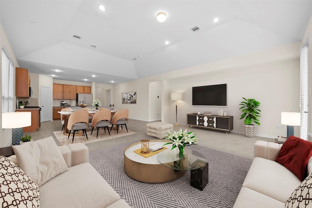 24018 Adobe Ridge Ln, Katy, TX 77493 - living room with lofted ceiling, recessed lighting, light colored carpet, and baseboards