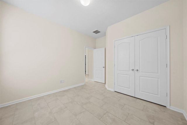 24018 Adobe Ridge Ln, Katy, TX 77493 - unfurnished bedroom featuring baseboards and a closet