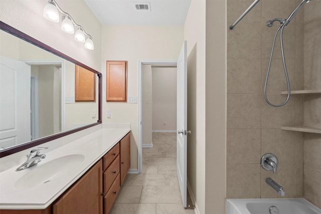 24018 Adobe Ridge Ln, Katy, TX 77493 - bathroom featuring vanity, shower / washtub combination, and tile patterned flooring
