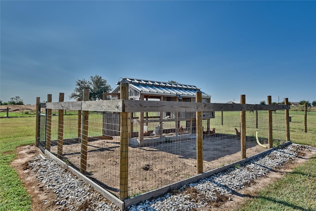 3077 Dees Cir, Sealy, TX 77474 - view of green lawn with exterior structure and an outbuilding