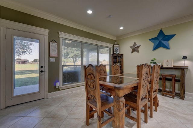 3077 Dees Cir, Sealy, TX 77474 - dining room featuring light tile patterned flooring, ornamental molding, baseboards, and recessed lighting