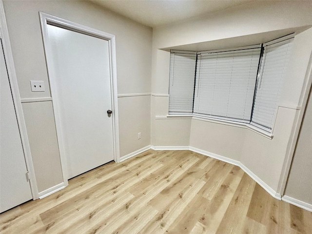 22906 Lemon Grove Dr, Spring, TX 77373 - unfurnished bedroom with light wood finished floors and baseboards