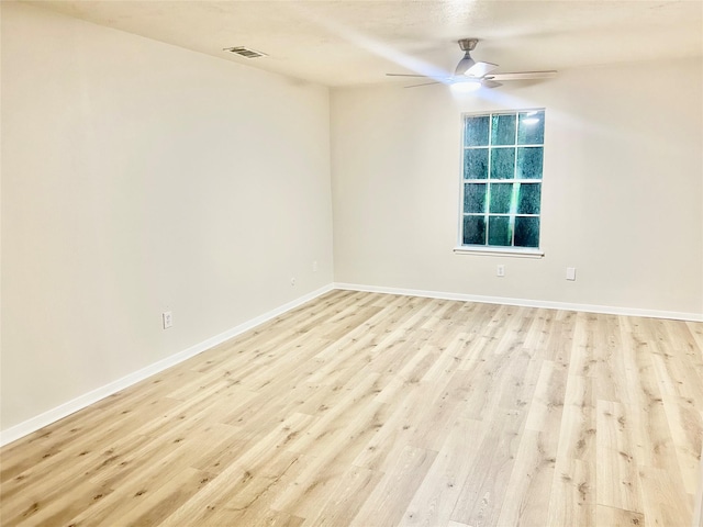 22906 Lemon Grove Dr, Spring, TX 77373 - spare room with light wood finished floors and ceiling fan