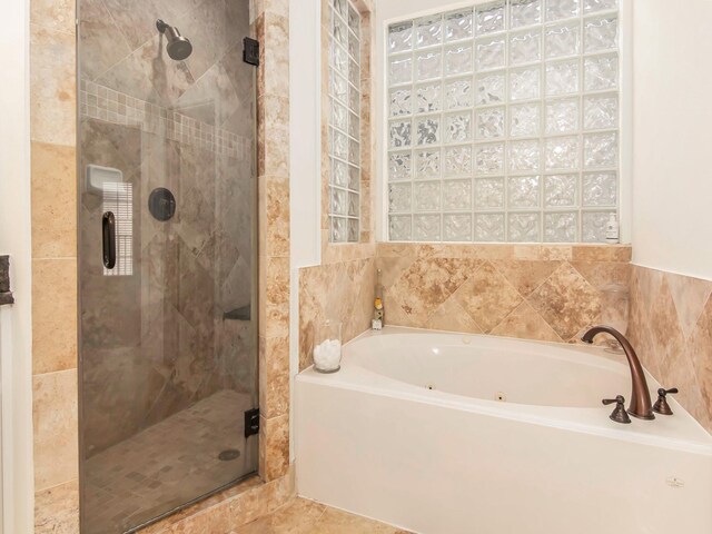 4133 Dickson St, Houston, TX 77007 - bathroom with a bath and a shower stall