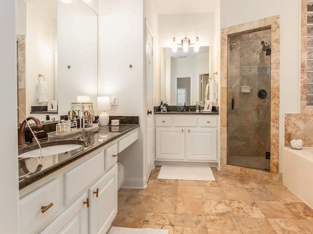 4133 Dickson St, Houston, TX 77007 - full bathroom with a stall shower, a bath, vanity, and stone finish flooring