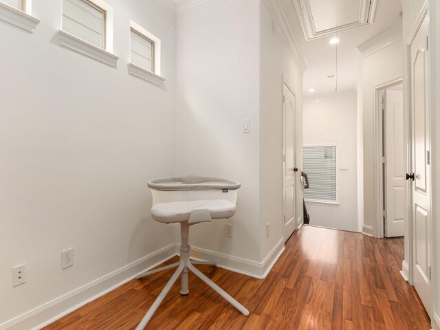 4133 Dickson St, Houston, TX 77007 - hallway featuring attic access, wood finished floors, baseboards, ornamental molding, and recessed lighting