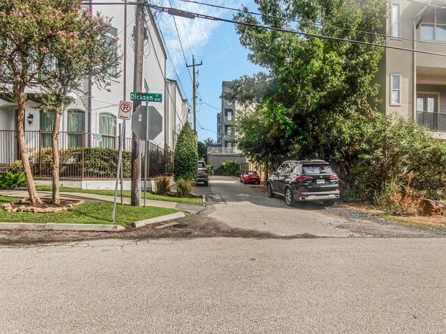 4133 Dickson St, Houston, TX 77007 - view of asphalt street with traffic signs and curbs