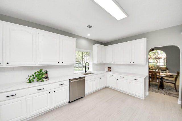 2019 Teakwood Pl, Sugar Land, TX 77478 - kitchen featuring stainless steel dishwasher, a sink, light wood finished floors, white cabinets, and recessed lighting