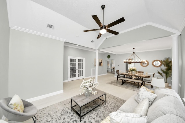 2019 Teakwood Pl, Sugar Land, TX 77478 - living room featuring lofted ceiling, a chandelier, ornate columns, ceiling fan, and light wood-style flooring