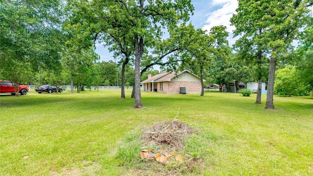 15486 W Loop Dr, Plantersville, TX 77363 - view of yard with view of wooded area