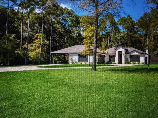 507 Carriage View Ln, Huffman, TX 77336 - view of home's community featuring a yard, driveway, and an attached carport