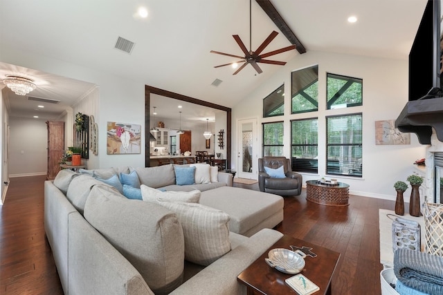 507 Carriage View Ln, Huffman, TX 77336 - living room featuring wood-type flooring, beam ceiling, high vaulted ceiling, a chandelier, and ceiling fan