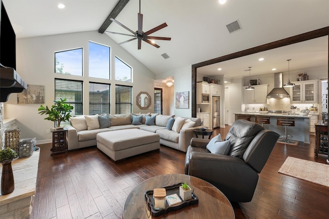 507 Carriage View Ln, Huffman, TX 77336 - living room with a ceiling fan, beam ceiling, dark wood finished floors, high vaulted ceiling, and recessed lighting