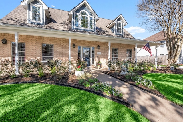 3233 Greenhead St, Katy, TX 77493 - cape cod-style house with brick siding and a porch