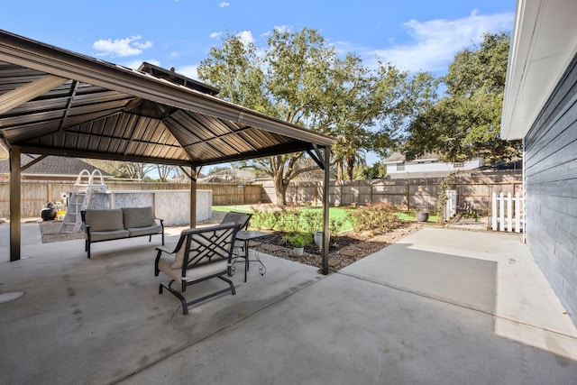 3233 Greenhead St, Katy, TX 77493 - fenced backyard featuring an outdoor hangout area, a gazebo, and a patio area