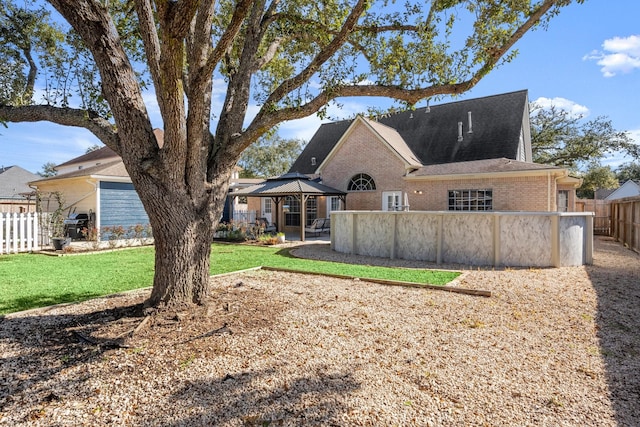 3233 Greenhead St, Katy, TX 77493 - back of house featuring brick siding