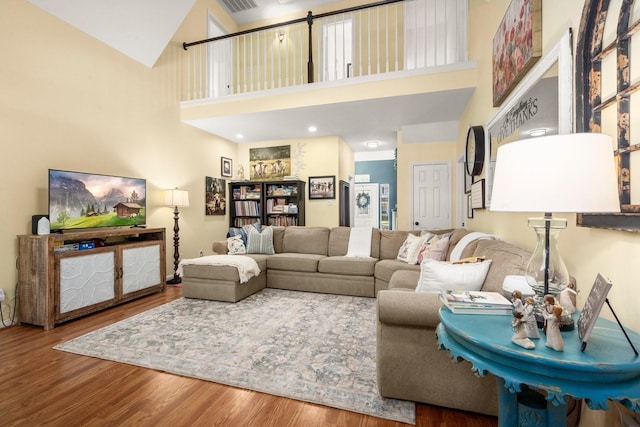 3233 Greenhead St, Katy, TX 77493 - living area with a high ceiling and wood finished floors