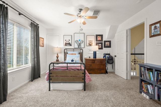 3233 Greenhead St, Katy, TX 77493 - carpeted bedroom with baseboards and a ceiling fan