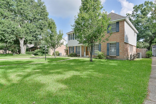 5411 Mossy Timbers Dr, Humble, TX 77346 - view of front of home with brick siding and a front lawn