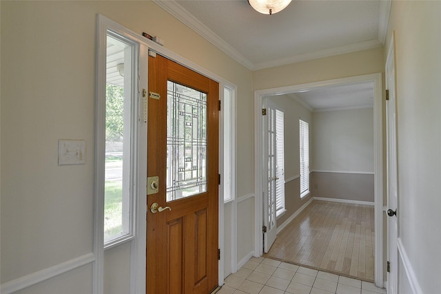 5411 Mossy Timbers Dr, Humble, TX 77346 - foyer entrance featuring light tile patterned floors and crown molding