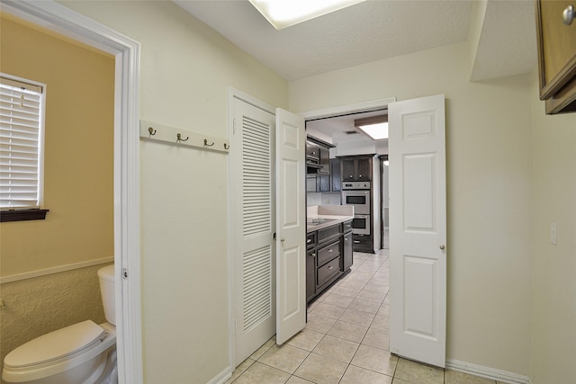 5411 Mossy Timbers Dr, Humble, TX 77346 - bathroom with tile patterned floors and vanity