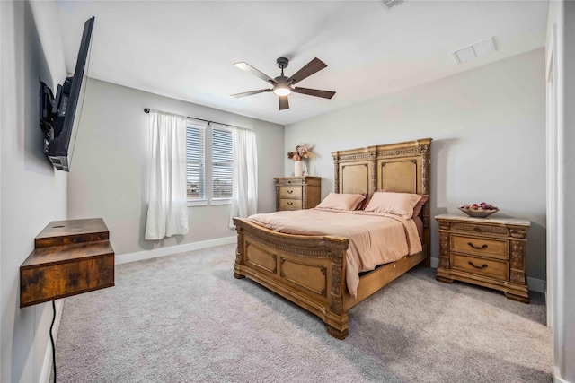 21310 Blue Wood Aster Ct, Cypress, TX 77433 - bedroom featuring light colored carpet, a ceiling fan, and baseboards