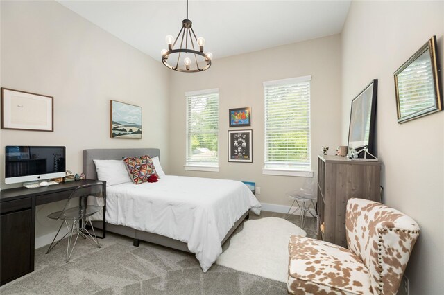 4926 Wunder Way, Houston, TX 77069 - bedroom with a chandelier, carpet floors, and baseboards