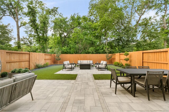 4926 Wunder Way, Houston, TX 77069 - view of patio / terrace with an outdoor living space and outdoor dining space